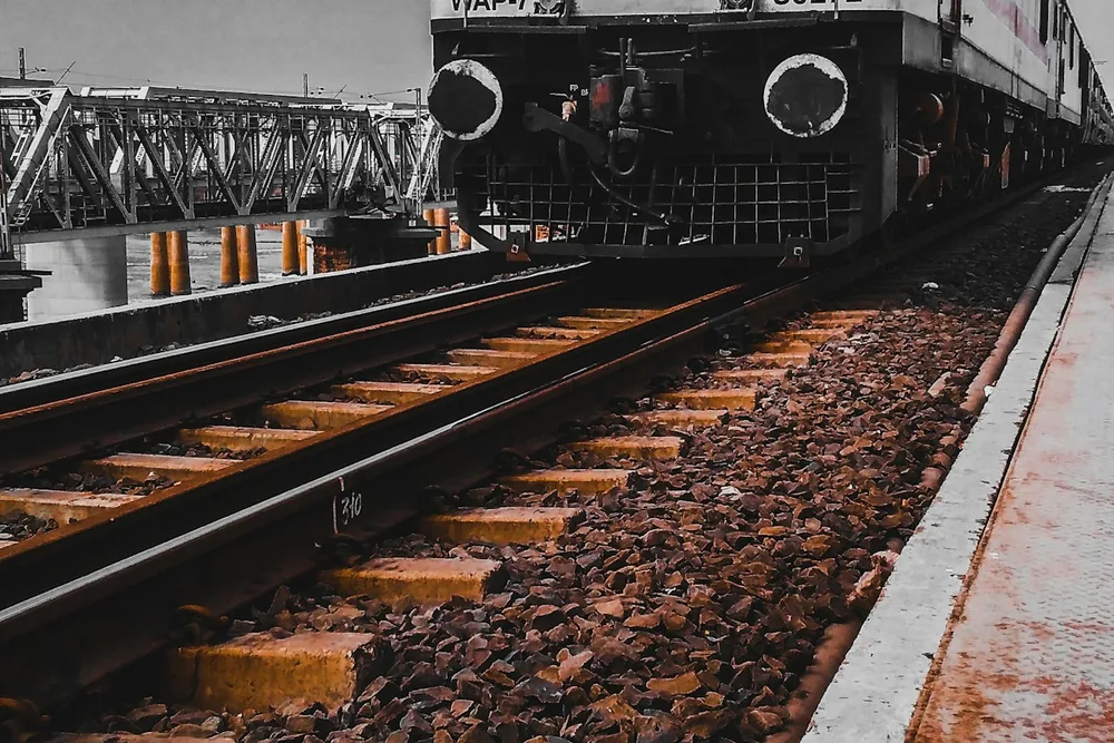 An Indian passenger train on railway tracks
